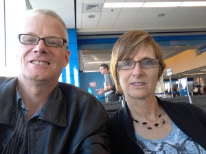 George and Janet Esser sitting at Detroit Airport